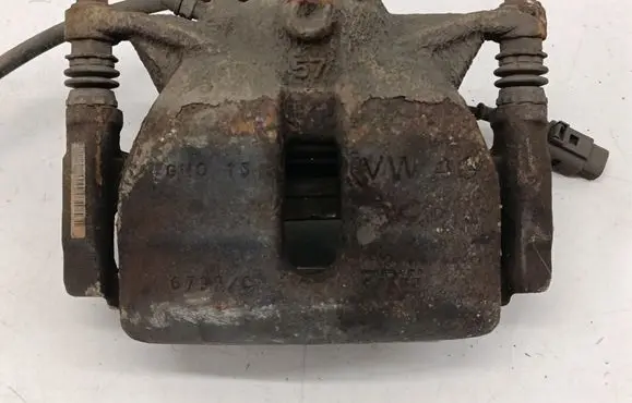 Volkswagen Golf VII Front brake caliper