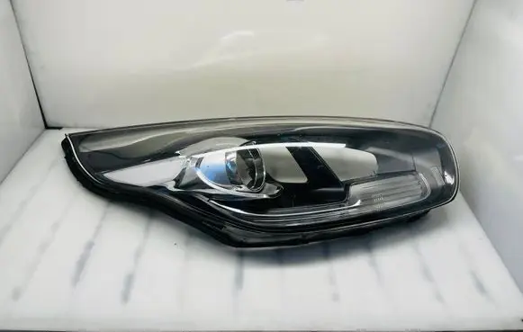 KIA Carens III Headlight lense 92102A4