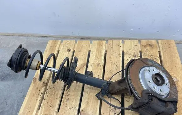 Front shock absorber with coil spring