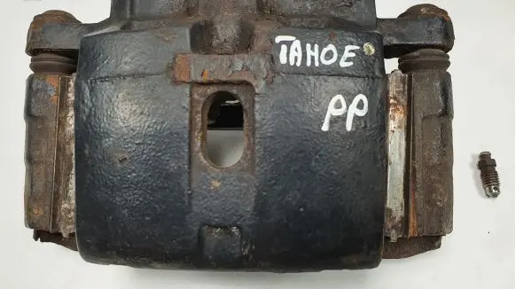Chevrolet Tahoe Front brake caliper 18025701