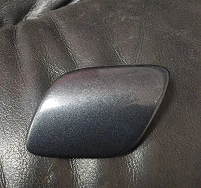 Headlight washer spray nozzle cap/cover