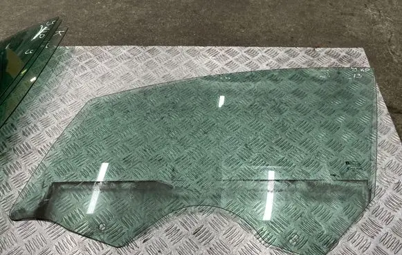 Opel Astra J Front door window glass four-door 