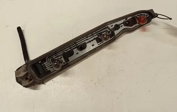 Opel Corsa C Tail light bulb cover holder