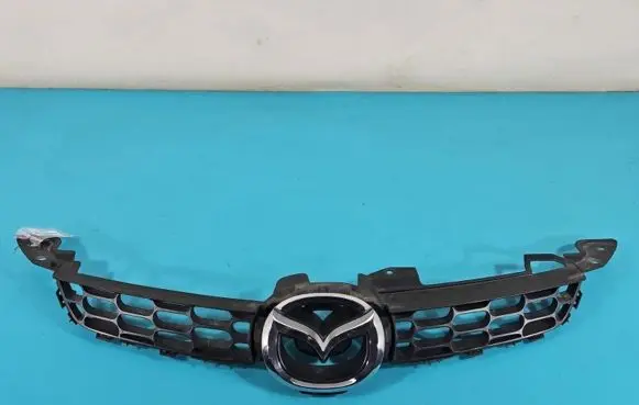 Mazda CX-7 Front bumper upper radiator grill EG21-50711 IMPRK1402936