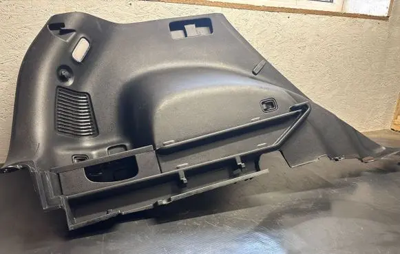 Trunk/boot lower side trim panel