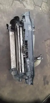 Radiator support slam panel