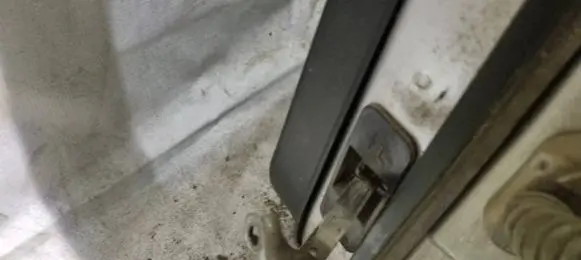 Nissan Note (E11) Rear door check strap stopper