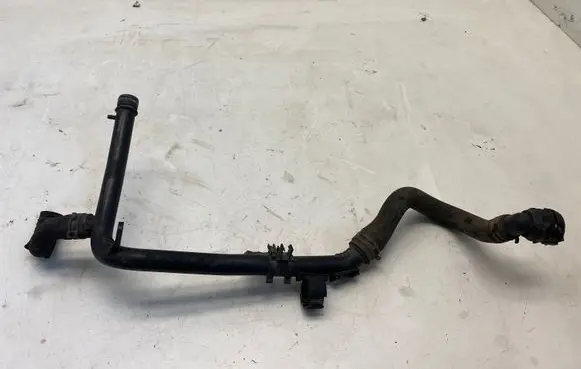 Volkswagen Jetta VI Engine coolant pipe/hose 03L121065AJ