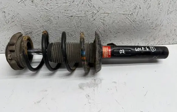 Volkswagen Golf VI Front shock absorber with coil spring
