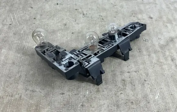 Volkswagen Golf IV Tail light bulb cover holder 38840751