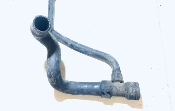 Volkswagen PASSAT B5 Engine coolant pipe/hose 8D0121055F