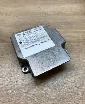 Volkswagen Touran I Airbag control unit/module 1T0909605