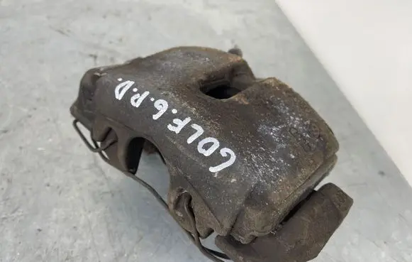 Volkswagen Golf VI Front brake caliper