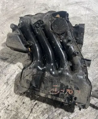 Volkswagen Golf IV Intake manifold 06A133203G