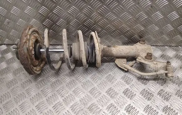 Nissan Primera Front shock absorber with coil spring
