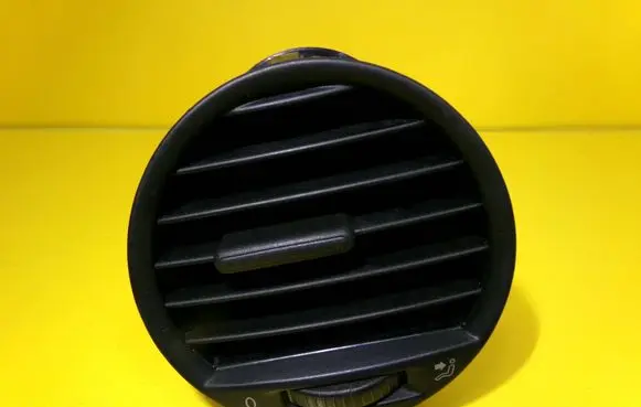 Volkswagen Caddy Dash center air vent grill 2K0819703B