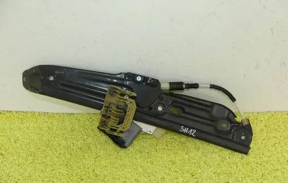 Rear door window regulator with motor