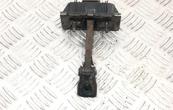 Front door check strap stopper