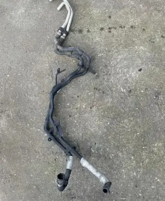 Volkswagen Touareg II Engine coolant pipe/hose 7P6121070BN