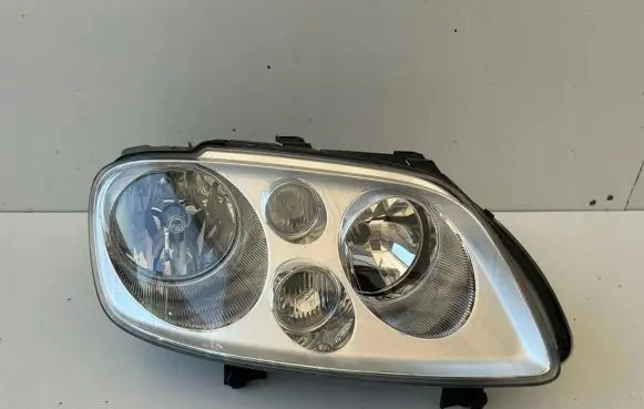 Volkswagen Touran I Headlight/headlamp 1T0941006D
