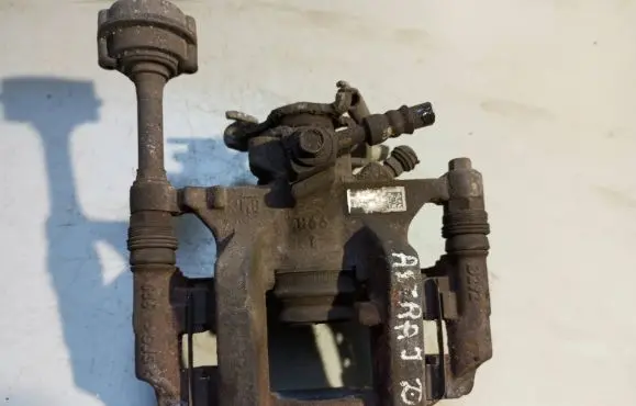 Opel Astra J Rear brake caliper 13407126