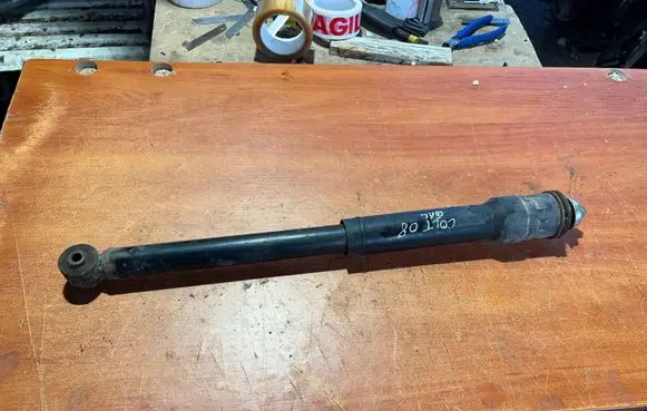 Mitsubishi Colt Rear shock absorber/damper MN125785 814901000210
