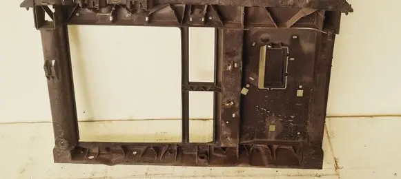 Radiator support slam panel