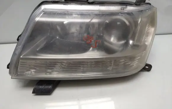 Suzuki Grand Vitara II Headlight/headlamp 10059079