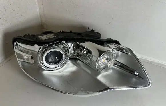 Volkswagen Touareg I Headlight/headlamp 7L6941040C 1ZS00945208