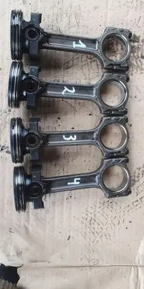 Piston with connecting rod
