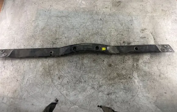 Top upper radiator support slam panel