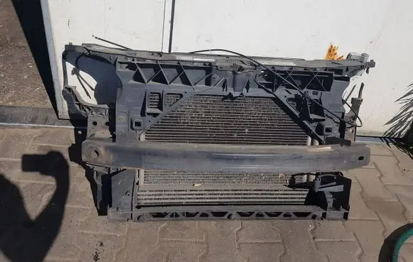 Radiator support slam panel