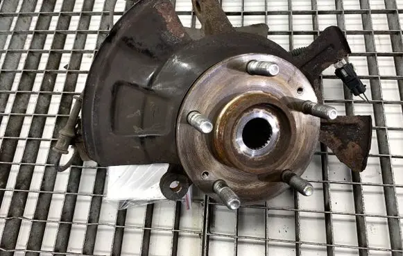 Front wheel hub spindle knuckle