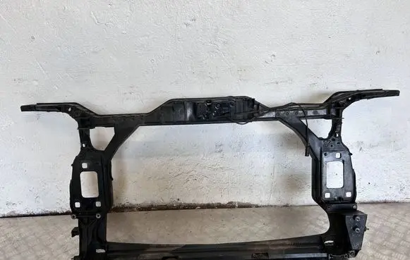 Radiator support slam panel bracket