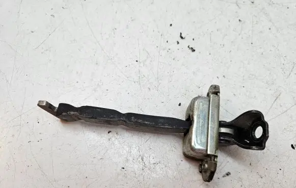 Toyota Yaris Front door check strap stopper