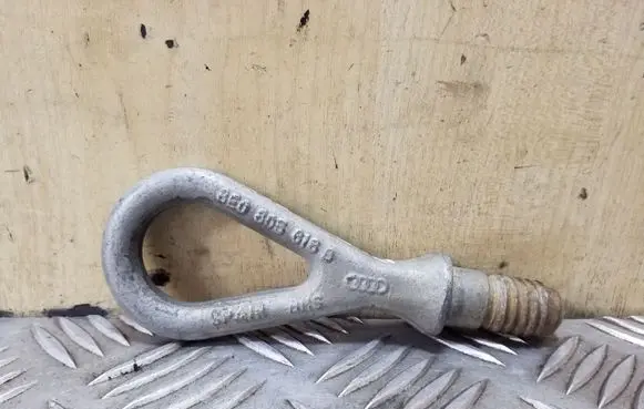 Towing hook eye