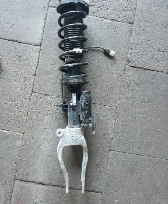 Front shock absorber with coil spring