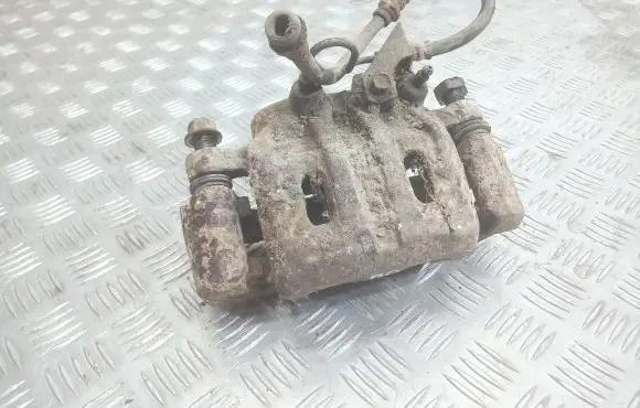Mitsubishi Pajero Front brake caliper
