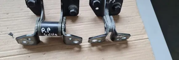 Front door lower hinge