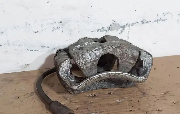 Opel Combo D Front brake caliper 