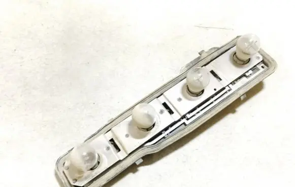Opel Astra G Tail light bulb cover holder