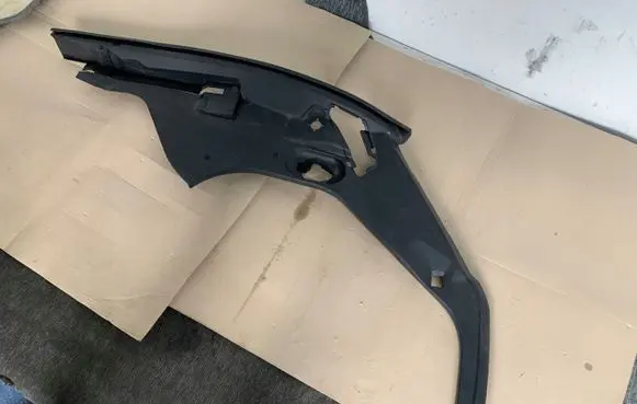 Engine bonnet/hood lock trim molding