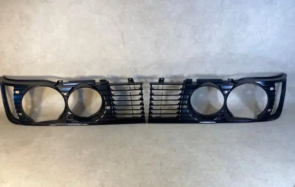 BMW 7 E23 Under headlight/headlamp trim 511319002710 1959663 1959664
