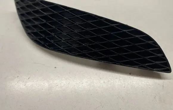 Opel Astra H Front bumper lower grill 13225763