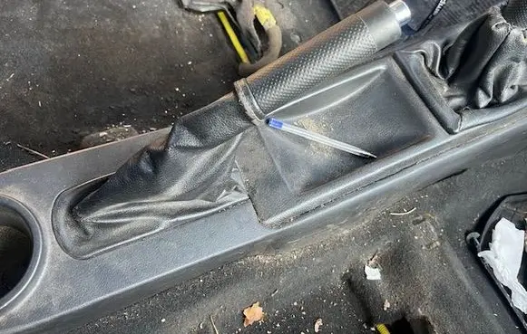 Chevrolet Aveo Hand brake release handle 