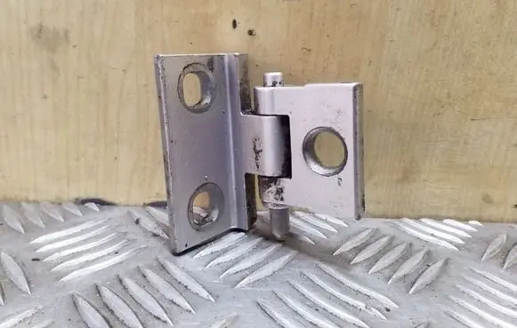 Front door lower hinge