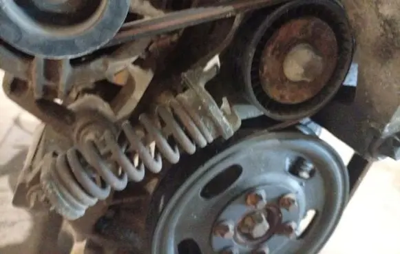 Opel Astra G Generator/alternator belt tensioner