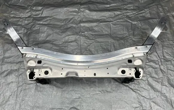 Top upper radiator support slam panel