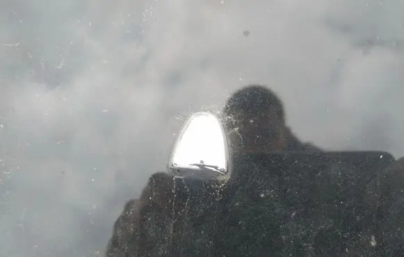 Windshield washer spray nozzle