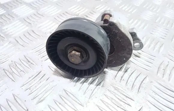 Opel Astra J Alternator belt tensioner 